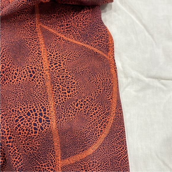 605. NWOT - Lululemon Invigorate High Rise Tight 25” Crackle Vintage Orange - Picture 8 of 9
